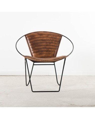 Fauteuil capitonné cuir